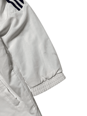 Fehér vintage streetwear dzseki ujja sötétkék csíkokkal és cipzáros zsebbel