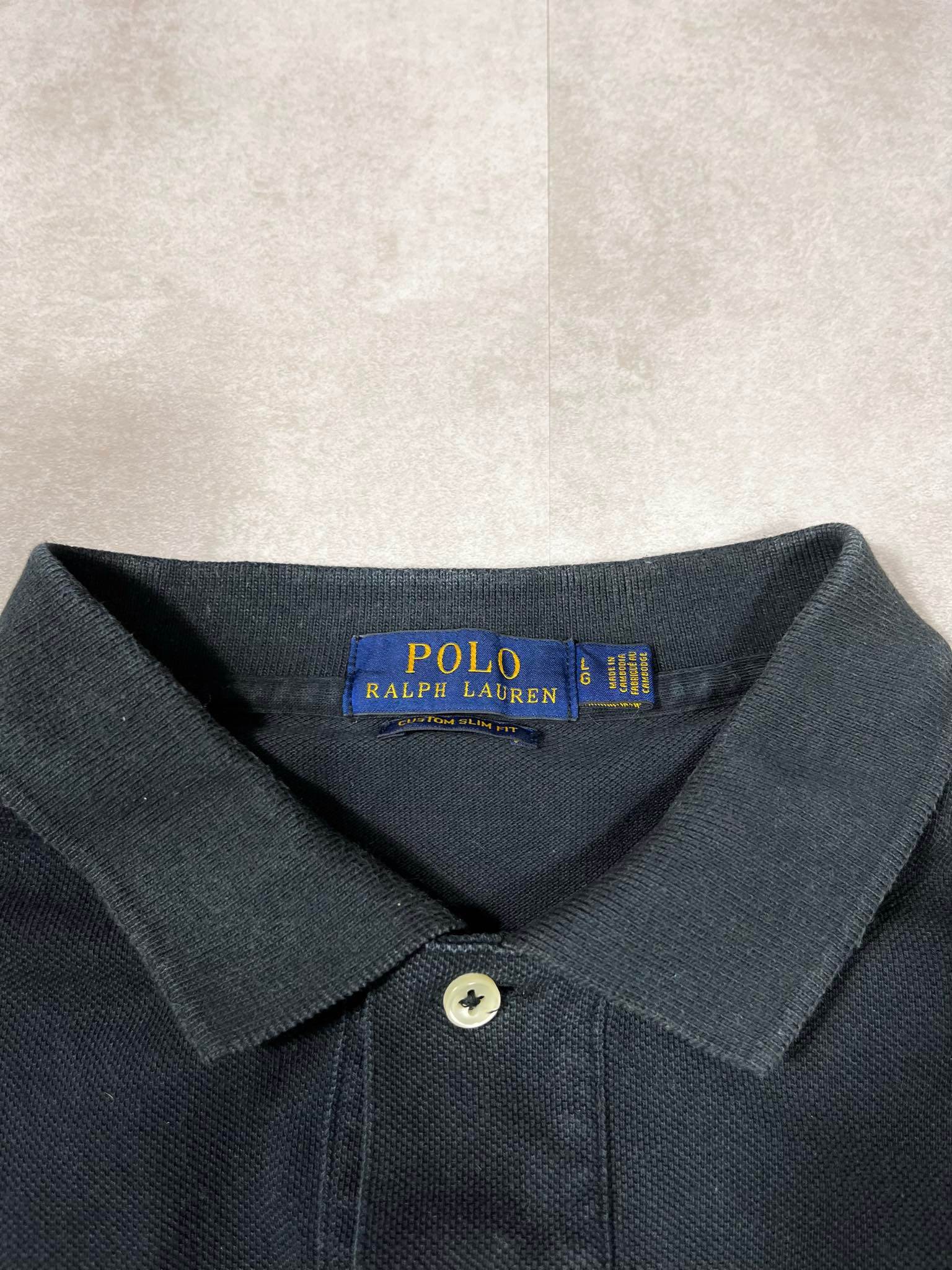 Ralph Lauren Polo (L)